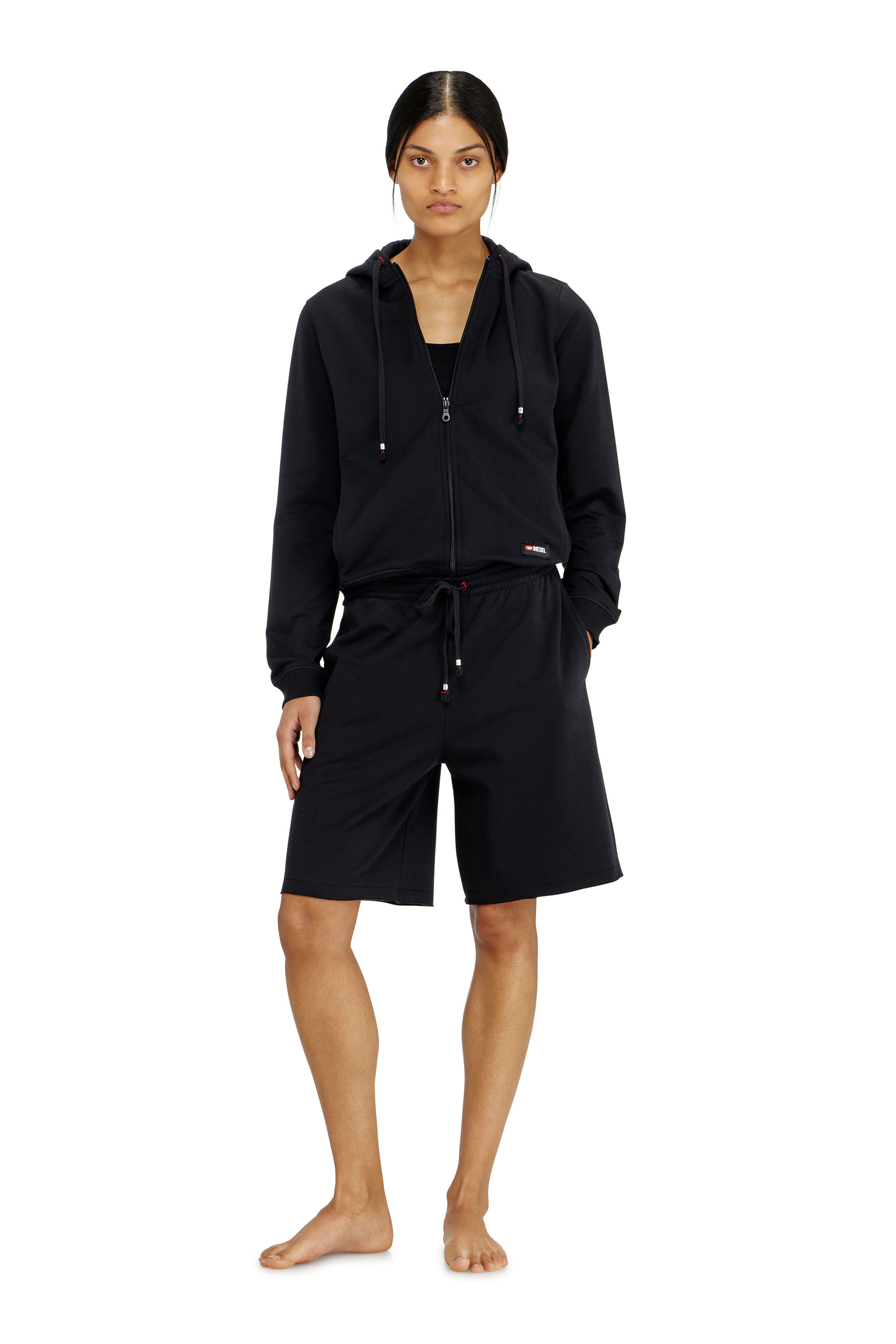 Diesel - CLARA-D-CORE, Woman's Peached sweat shorts with raw hems in Black - 1