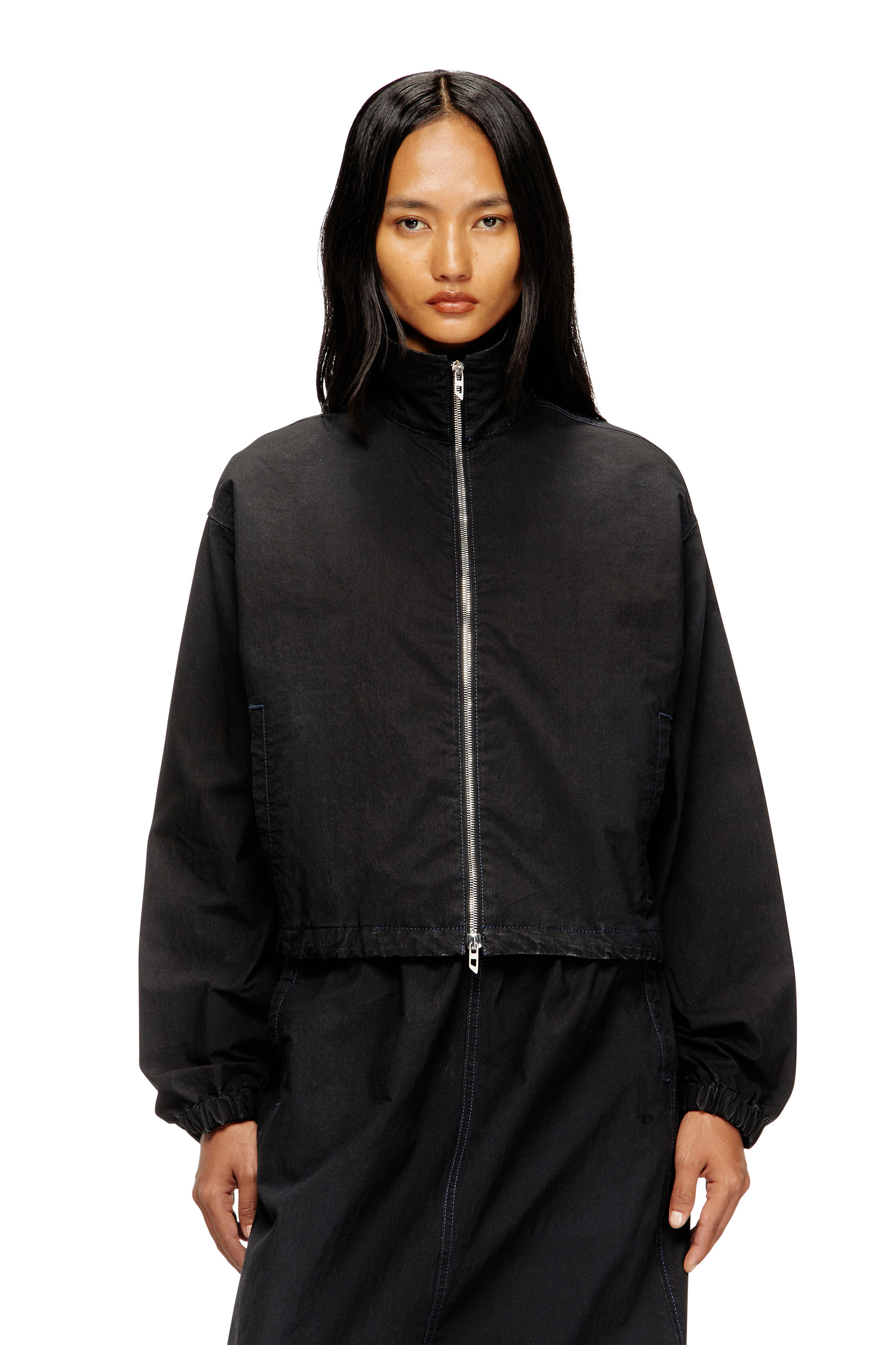Diesel - DE-SANDERZ JOGG, Woman's High-neck technical JoggJeans jacket in Black - 1